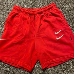 Limited release double Nike swoosh shorts- brand new- red- men’s medium